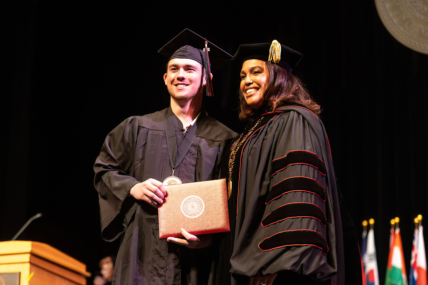 Oklahoma City Community College President Dr. Mautra Staley Jones with a graduating student during 2025 Commencement.